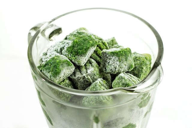 A jar of frozen spinach